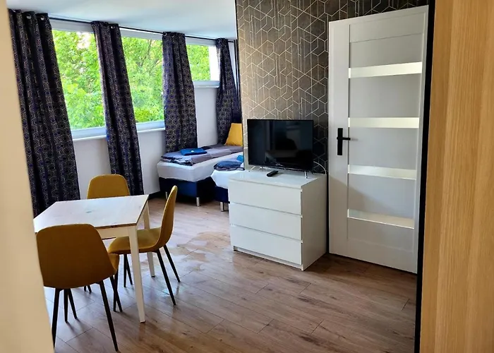 Am Center 3 Wyzwolenia Апартаменты Щецин